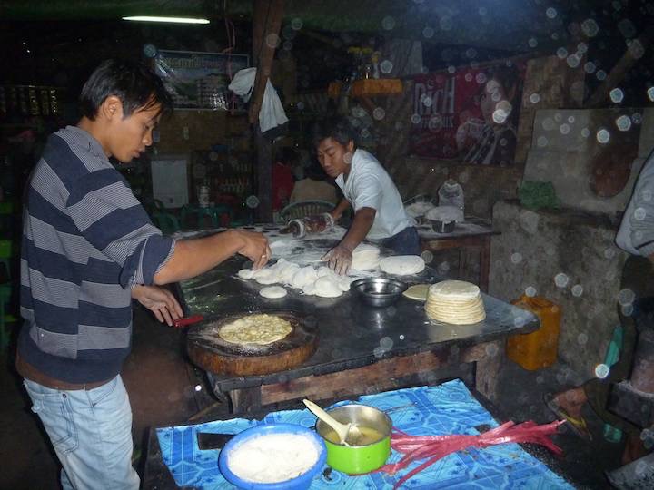 A bakery stall making &ldquo;mount pear thlet&rdquo; (small bread in oven)